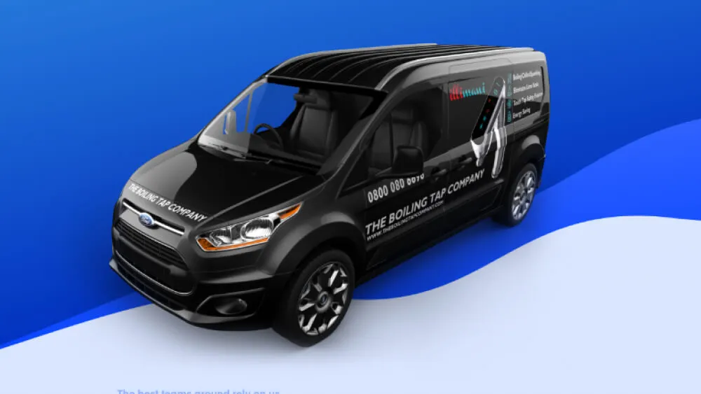 Black Ford van with signage for The Boiling Tap Company displaying a phone number and website on blue and white background.